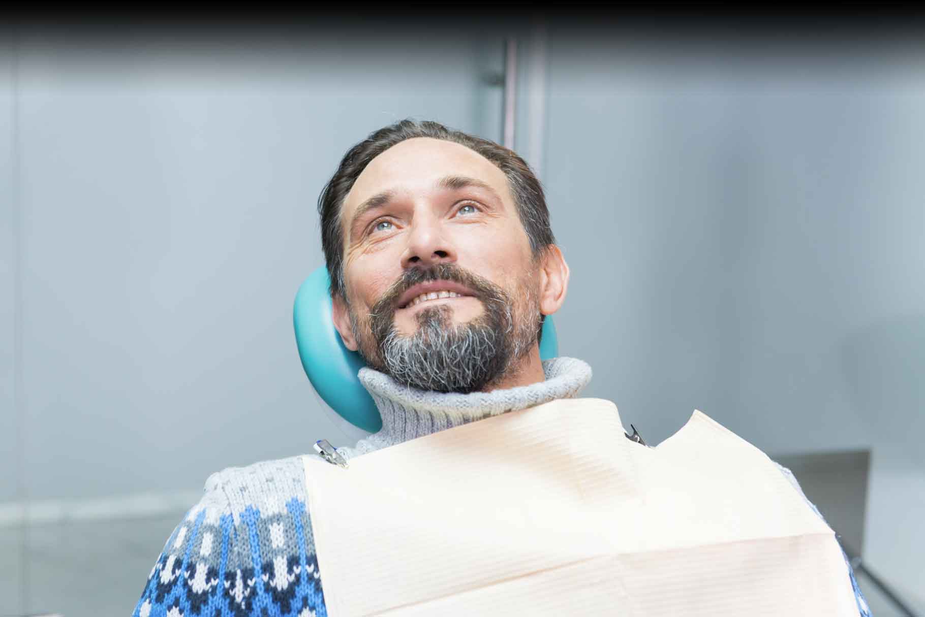 person in a dental chair for ozone therapy